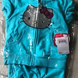 blue sequin tracksuit